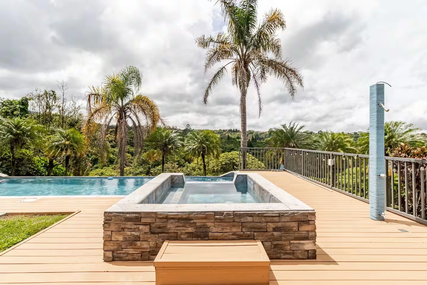 Gazebo and swing beside the heated saltwater pool at Mango Valley